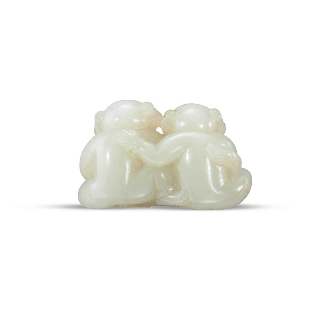 A CARVED WHITE JADE ‘BOYS AND LONGEVITY’ GROUP