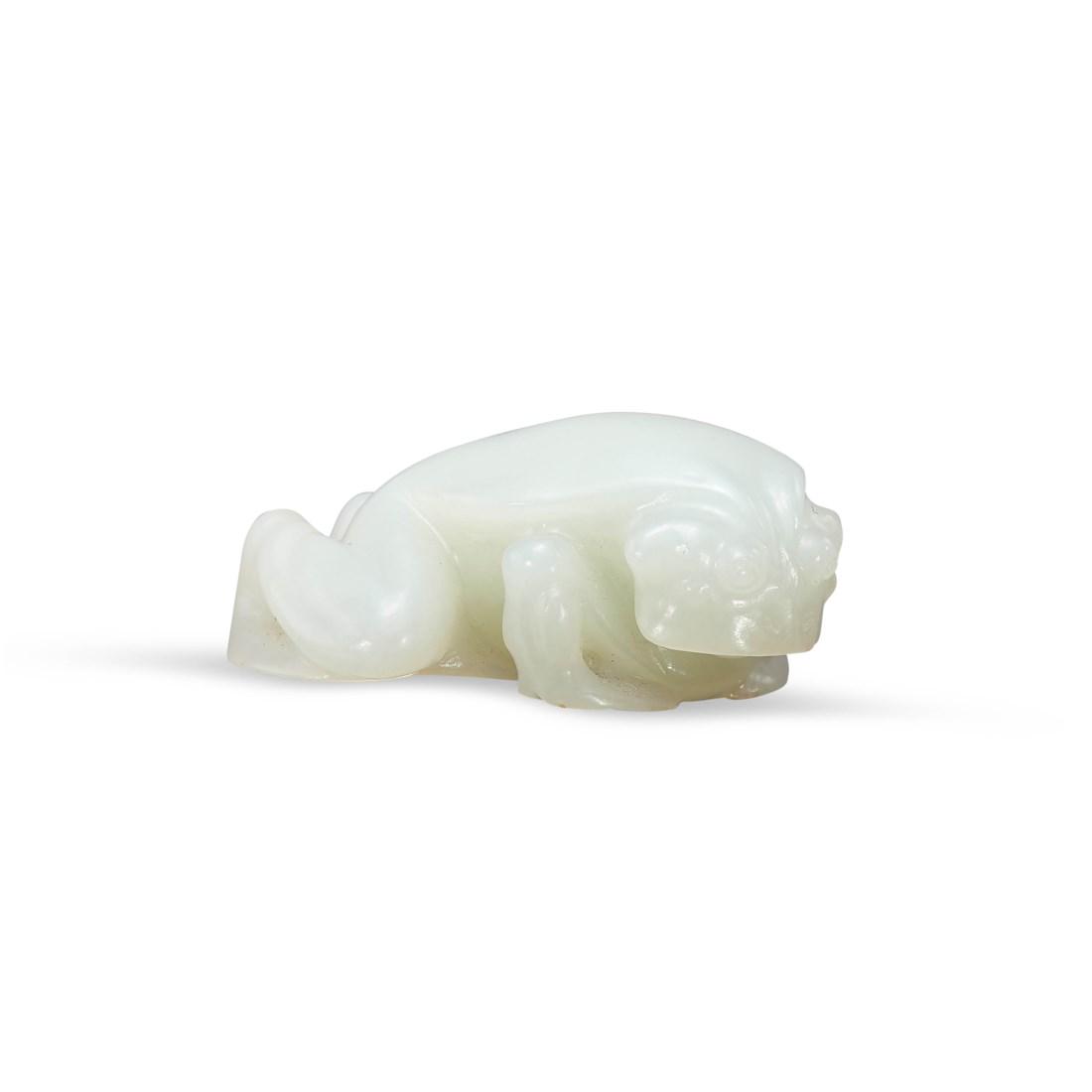 A CARVED WHITE JADE TOAD