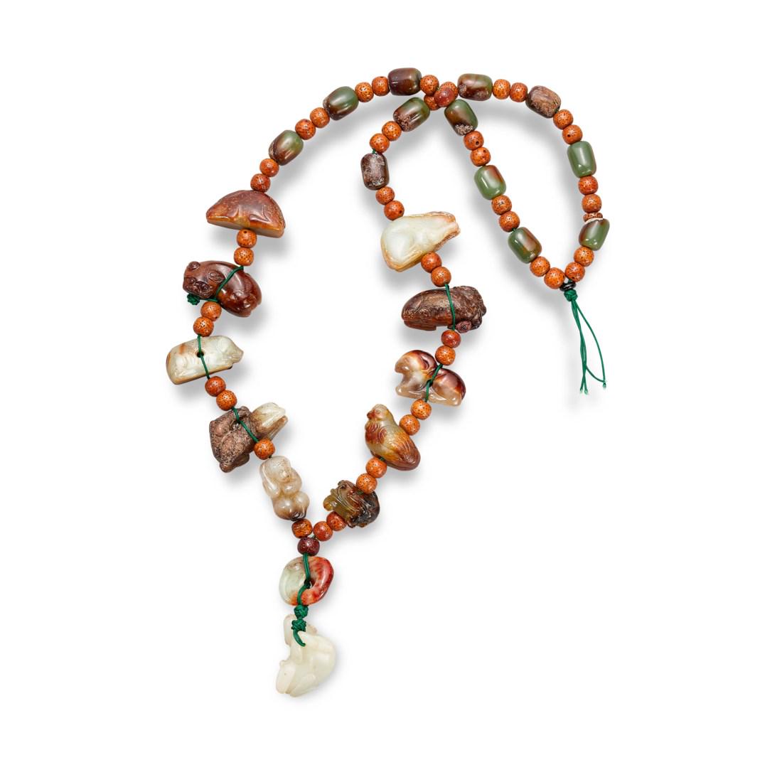 A BEADED JADE AND HARDSTONES 'ANIMAL' NECKLACE