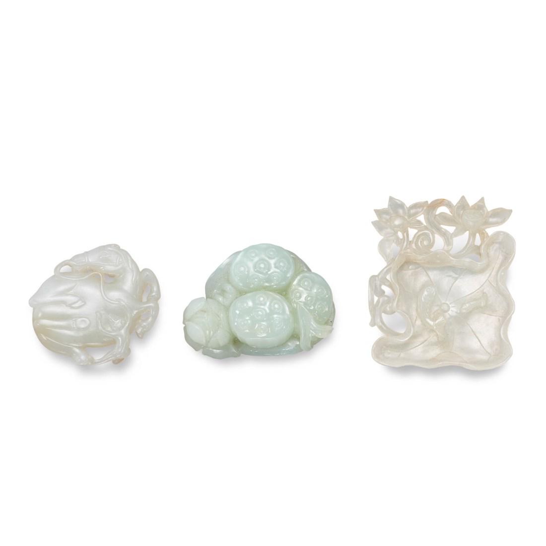 TWO CARVED WHITE JADE OPENWORK PLAQUES AND A CARVED