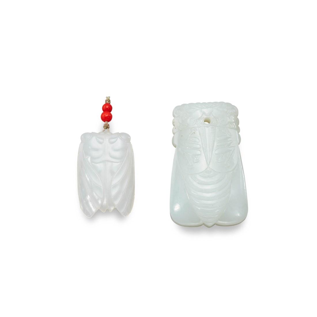 TWO CARVED WHITE JADE ‘CICADA’ PENDANTS