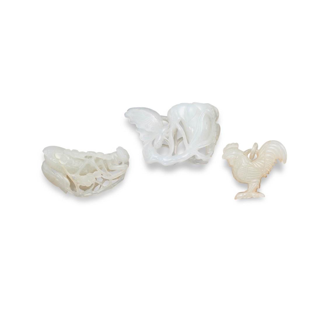 THREE WHITE JADE OPENWORK CARVINGS