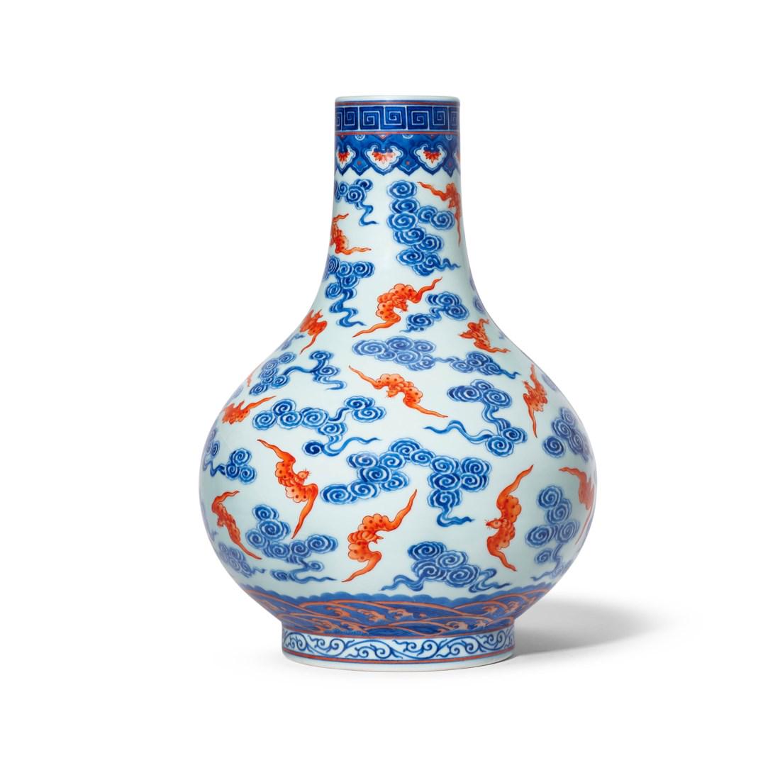 A BLUE AND WHITE AND IRON-RED DECORATED ‘BAT AND CLOUD’