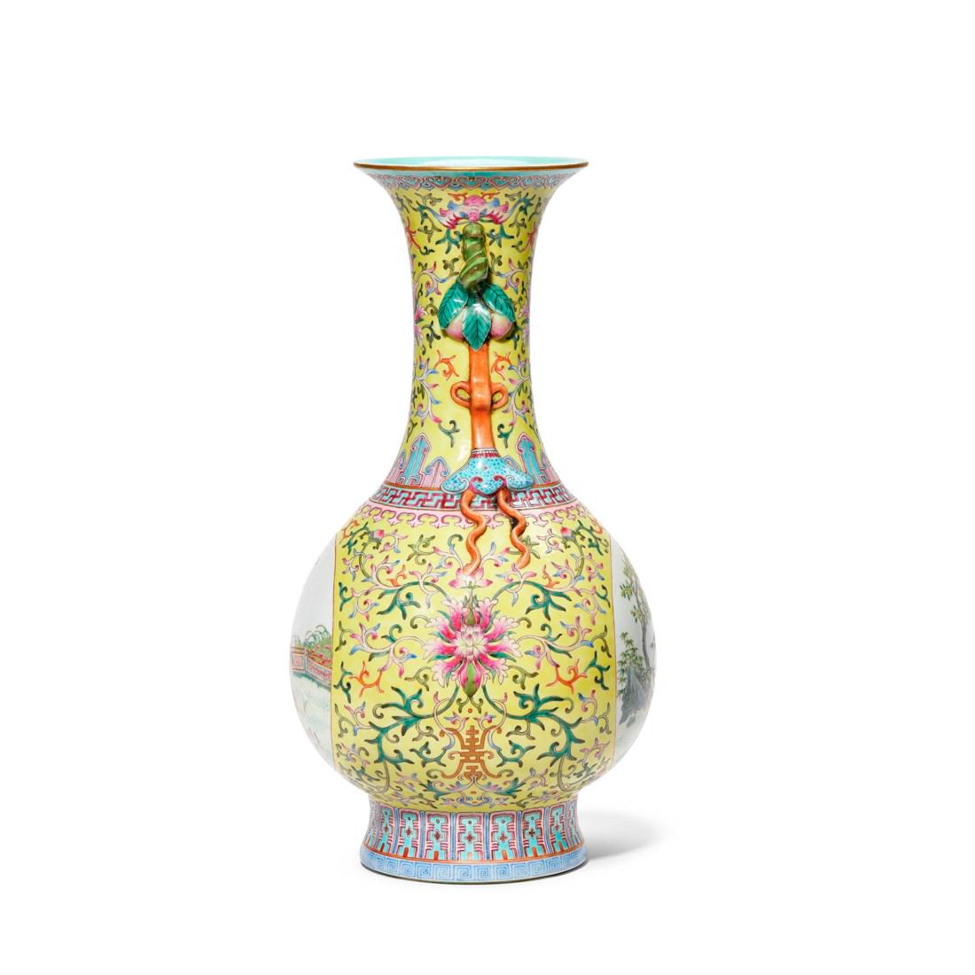 A FAMILLE ROSE YELLOW-GROUND ‘BOYS’ TWIN-HANDLED VASE