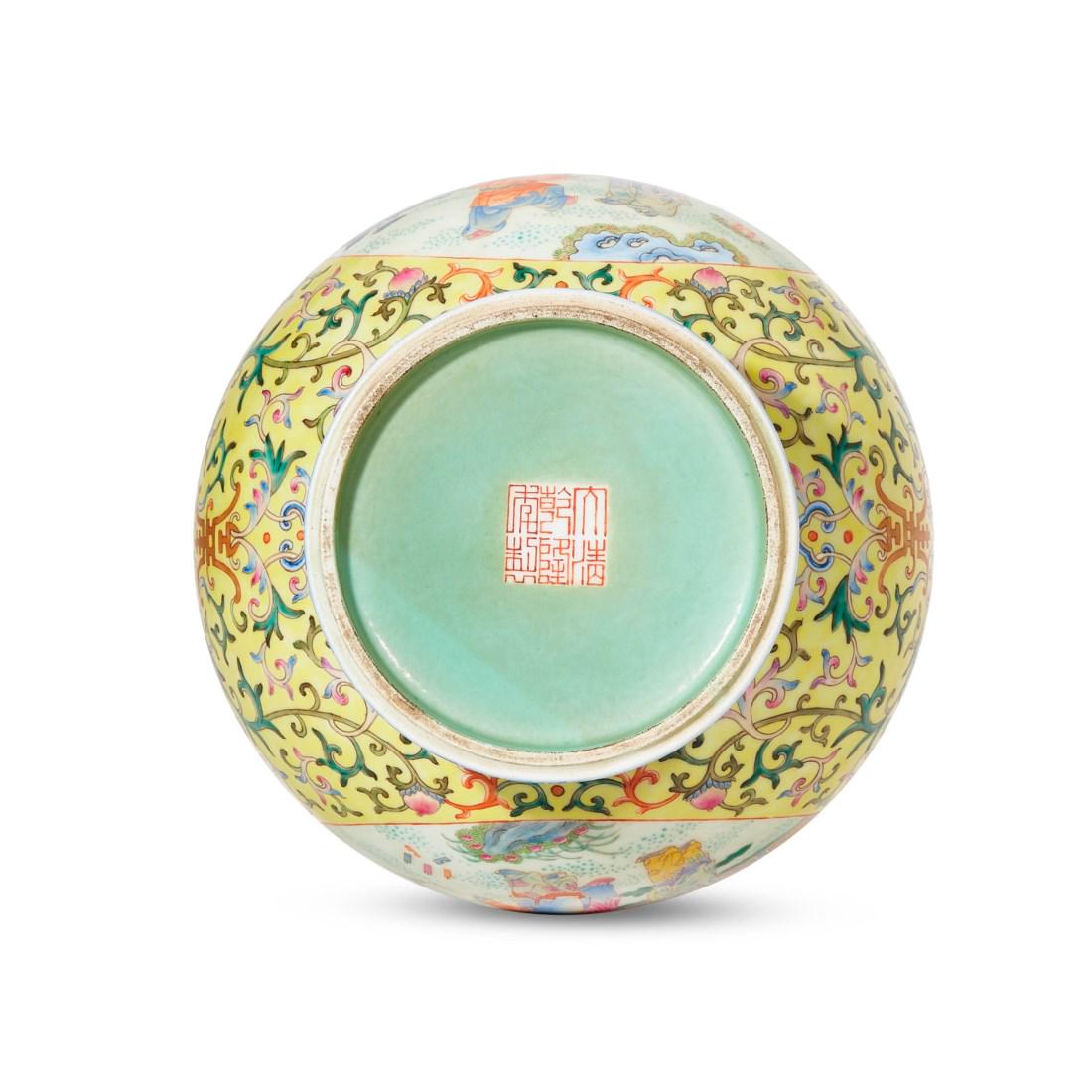 A FAMILLE ROSE YELLOW-GROUND ‘BOYS’ TWIN-HANDLED VASE