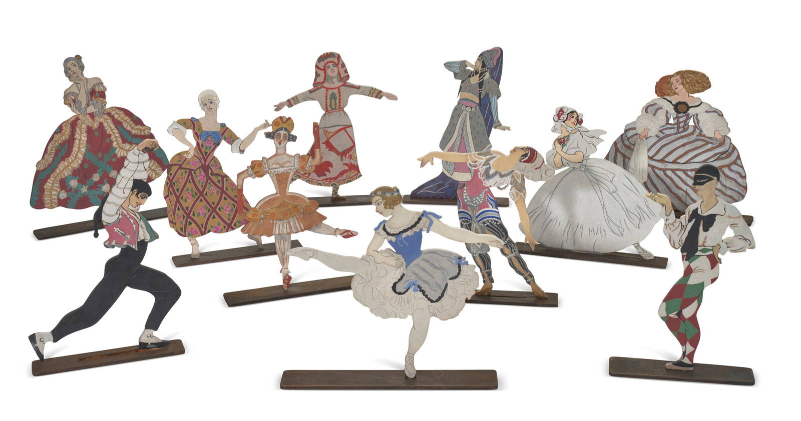 A Set Of Eleven Painted Wood Figurines Representing Dancers Of The