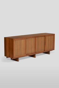 GEORGE NAKASHIMA (1905-1990): CUSTOM FOUR-DOOR CABINET, 1959 GEORGE NAKASHIMA (1905-1990) Custom Four-Door Cabinet, 1959 American black walnut, pandanus cloth 32 x 84 x 20 in. (81.3 x 213.4 x 50.8 cm) Provenance Private Collection