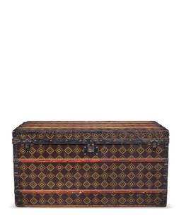 A VERY RARE, BROWN AND TAN PATTERNED STENCILED CANVAS & WOOD MALLE COURRIER 110: LOUIS VUITTON, CIRCA 1890 GRADE: 4 56 w x 110 l x 56 h cm Includes key, two interior trays, and small Christie's dustbag. Two exterior sides are monogrammed "D" in a diamond in white.