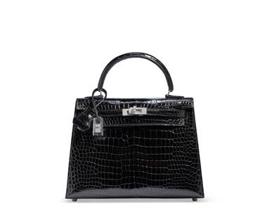 AN EXCEPTIONAL, SHINY BLACK POROSUS CROCODILE SELLIER KELLY 25 WITH 18K WHITE GOLD & DIAMOND: HERMÈS, 2019 GRADE: 1 25 w x 18 h x 9 d cm Includes lock, keys, clochette, two small dustbags, felt protector, rain protector, diamond certificate, care card, ribbon, and box. Features 298 diamon
