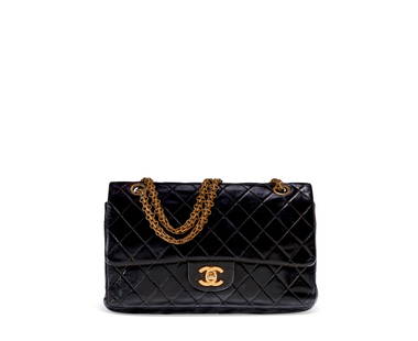 A BLACK LAMBSKIN LEATHER MEDIUM CLASSIC DOUBLE FLAP BAG WITH GOLD HARDWARDE & MADEMOISELLE CHAIN: CHANEL, 1997-1999 GRADE: 3.5 25 w x 16 h x 6 d cm Includes Christie's dustbag.