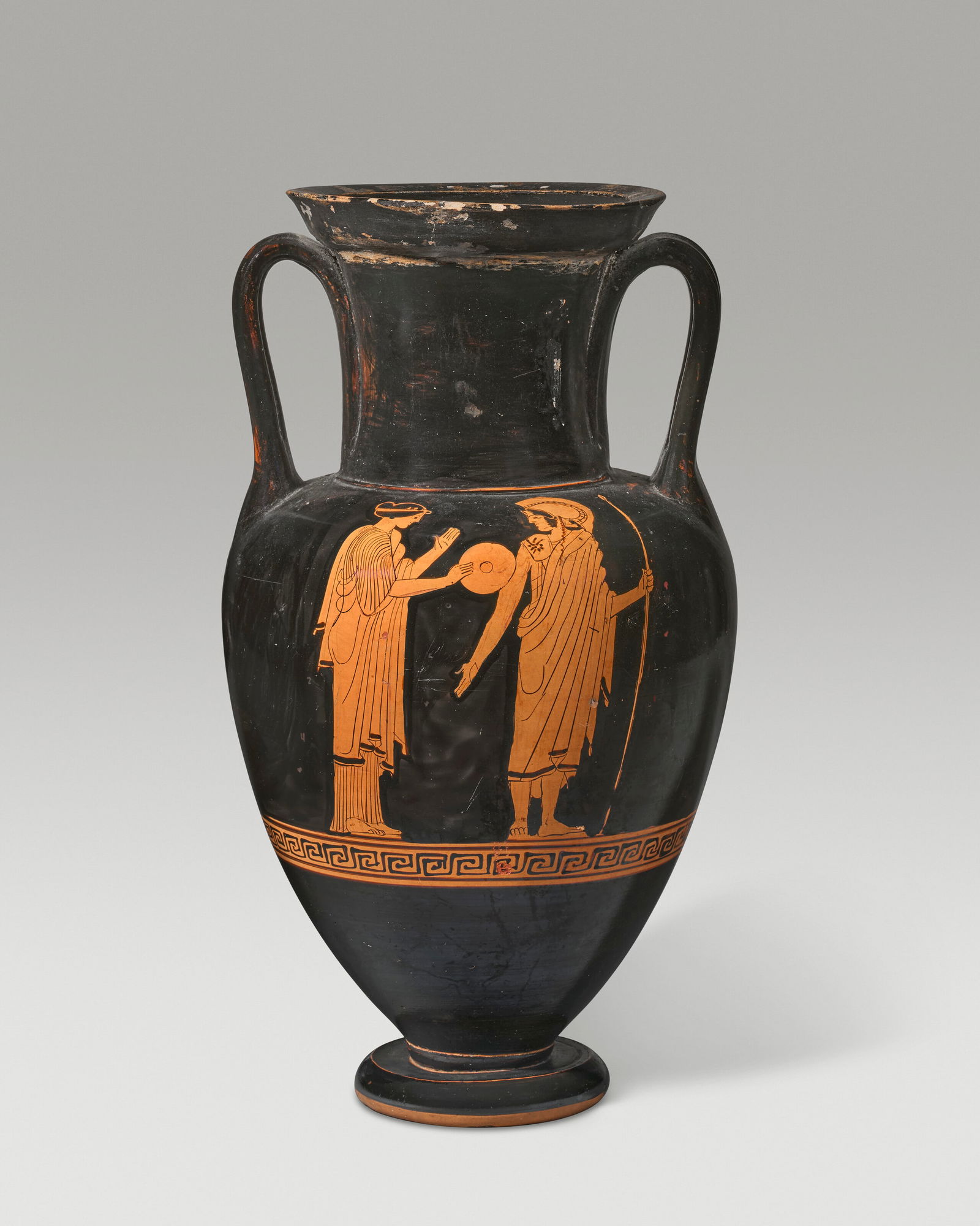 AN ATTIC RED-FIGURED NOLAN AMPHORA: AN ATTIC RED-FIGURED NOLAN AMPHORA CIRCA 460-450 B.C. Details AN ATTIC RED-FIGURED NOLAN AMPHORA CIRCA 460-450 B.C. 13 ¾ in. (34.3 cm.) high Provenance with Galerie Günter Puhze, Freiburg, b