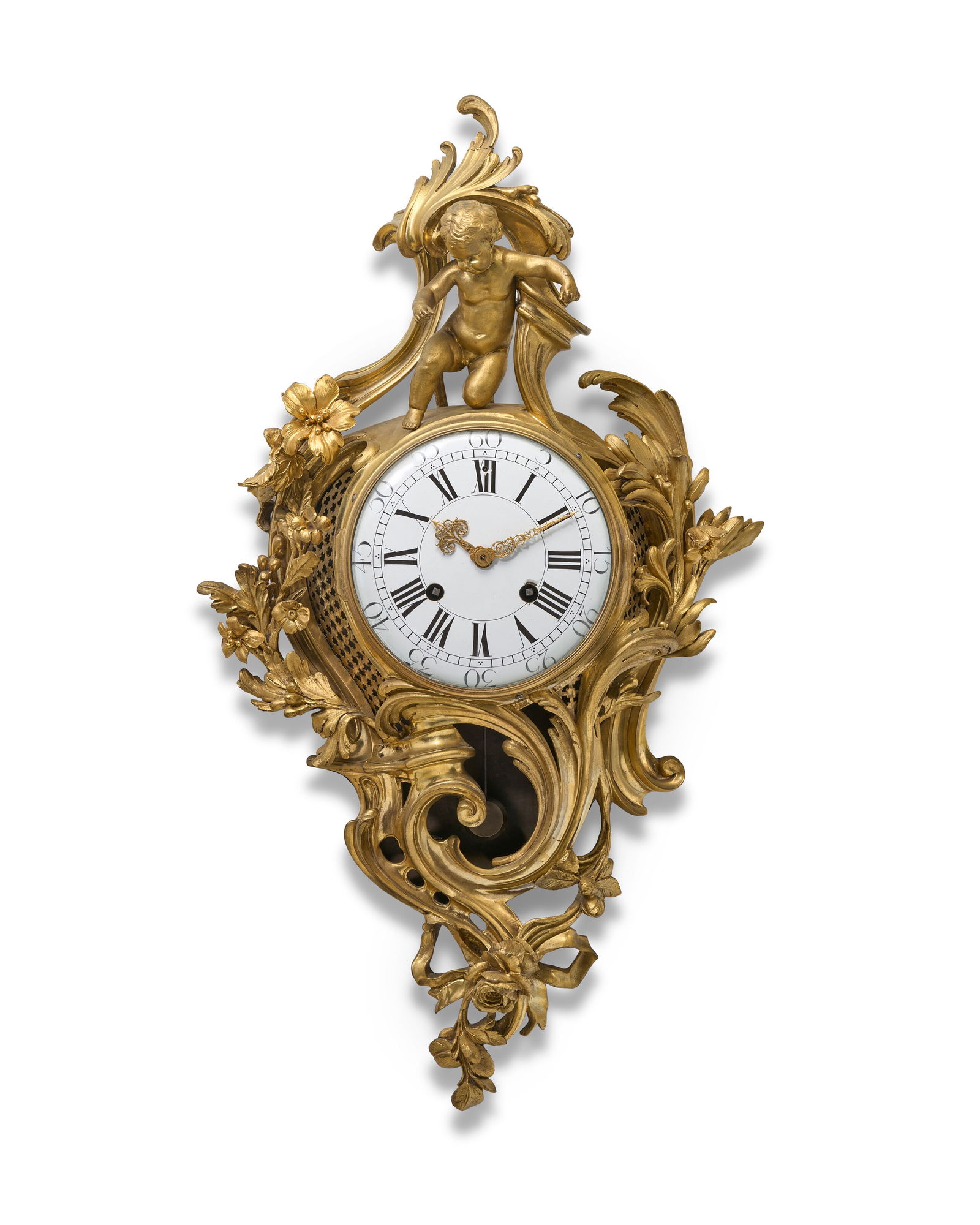 A LOUIS XV ORMOLU CARTEL CLOCK: A LOUIS XV ORMOLU CARTEL CLOCK CIRCA 1740 Details The circular white enamel dial with Roman chapters and Arabic minutes, the cartouche-shaped case surmounted by a putto and cast with pierced scrolls,