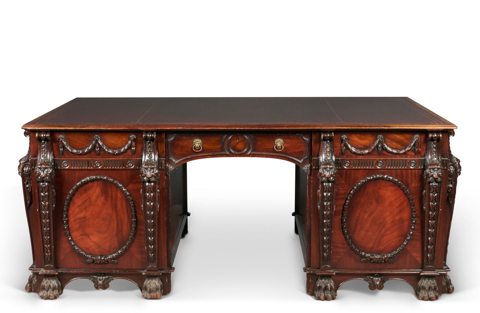 AN ENGLISH MAHOGANY PARTNERS' DESK: AN ENGLISH MAHOGANY PARTNERS' DESK 20TH CENTURY, AFTER THE DESIGN BY THOMAS CHIPPENDALE FOR NOSTELL PRIORY Details The brown leather writing-surface above a frieze drawer flanked by a cupboard door en