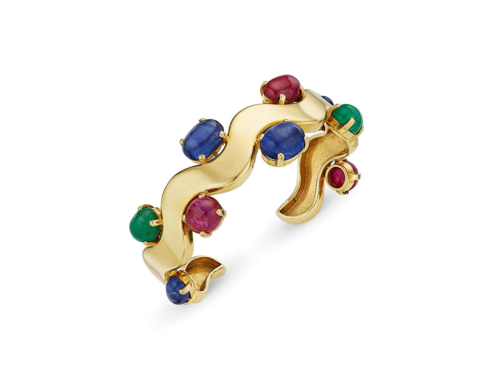 SUZANNE BELPERRON MULTI-GEM AND GOLD 'WAVE' CUFF BRACELET: SUZANNE BELPERRON MULTI-GEM AND GOLD 'WAVE' CUFF BRACELET Details SUZANNE BELPERRON MULTI-GEM AND GOLD 'WAVE' CUFF BRACELET Oval ruby, sapphire and emerald cabochons, 18k yellow gold (French mark), ci