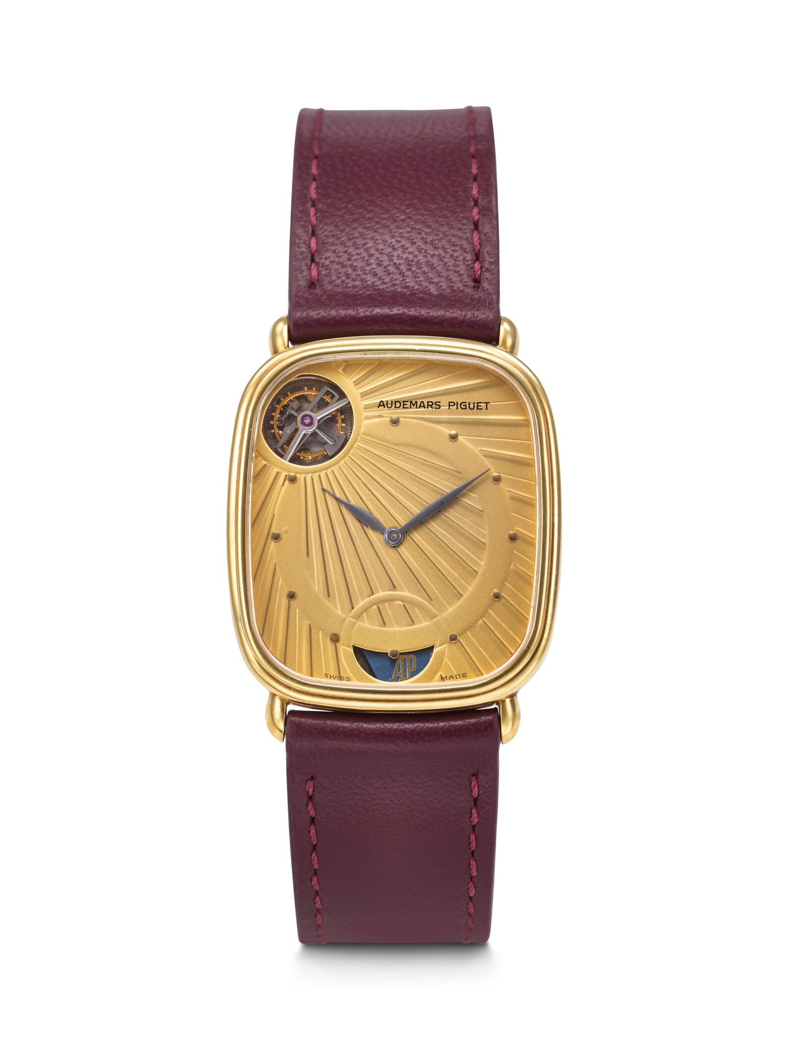 AUDEMARS PIGUET. A HIGHLY IMPRESSIVE AND VERY THIN 18K GOLD WORLD'S FIRST AUTOMATIC TOURBILLON (1 of 3)