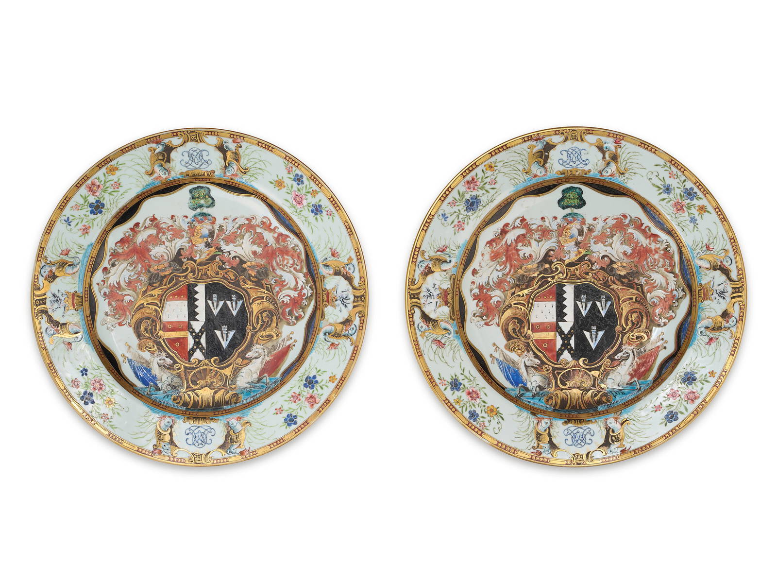 A PAIR OF CHINESE EXPORT PORCELAIN 'ENGLISH MARKET' ARMORIAL CHARGERS FROM THE LEAKE OKEOVER SERVICE
