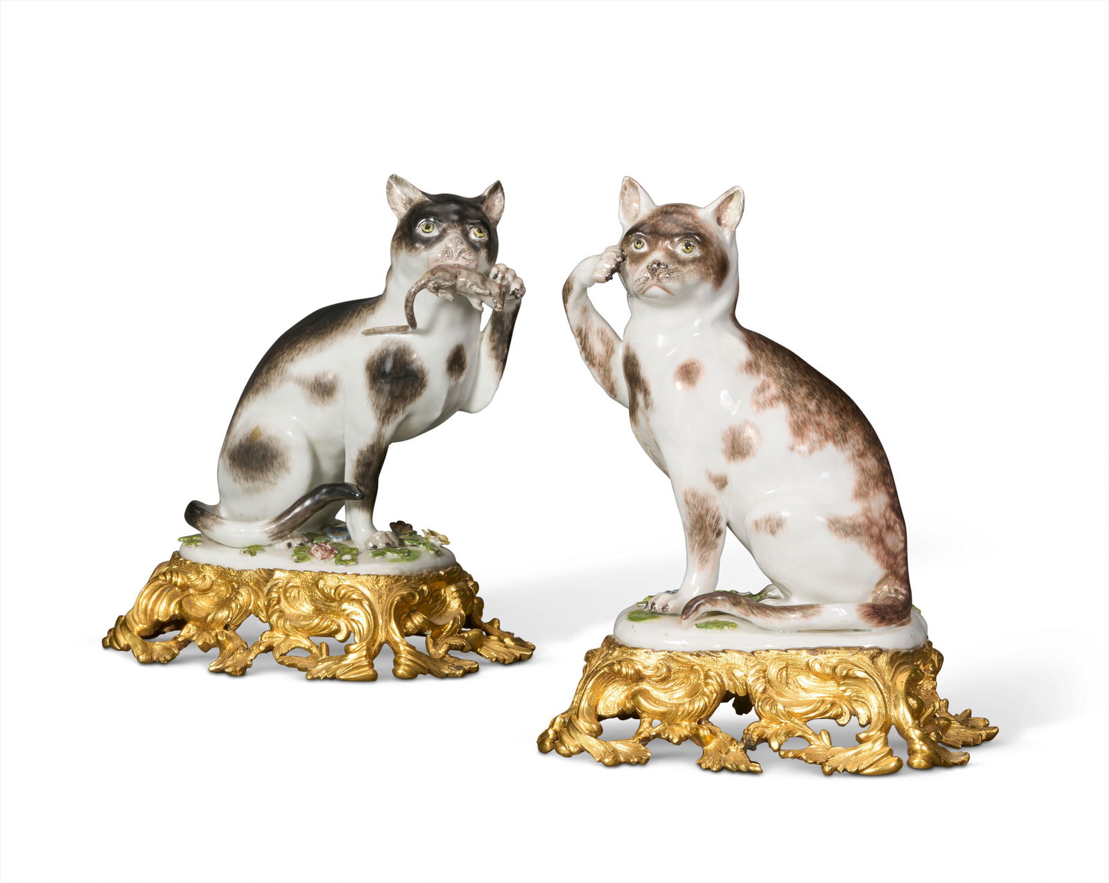 A PAIR OF ORMOLU-MOUNTED MEISSEN PORCELAIN MODELS OF CATS THE PORCELAIN CIRCA 1741, MODELED BY J.J.: A PAIR OF ORMOLU-MOUNTED MEISSEN PORCELAIN MODELS OF CATS THE PORCELAIN CIRCA 1741, MODELED BY J.J. KÄNDLER, THE ORMOLU MOUNTS FIRST HALF 19TH CENTURY Details A PAIR OF ORMOLU-MOUNTED MEISSEN