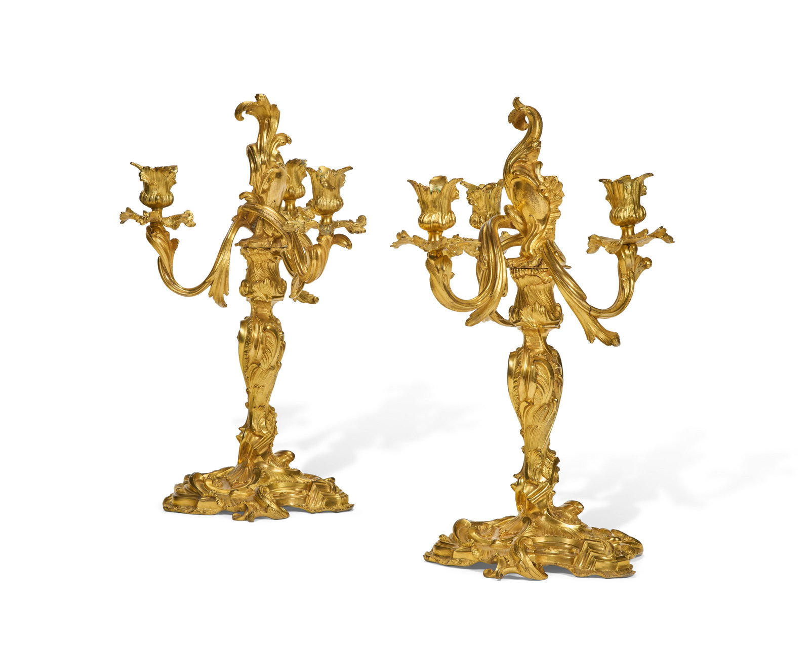 A PAIR OF LOUIS XV ORMOLU THREE-BRANCH CANDELABRA IN THE MANNER OF JUSTE-AURELE MEISSONNIER, CIRCA (1 of 2)