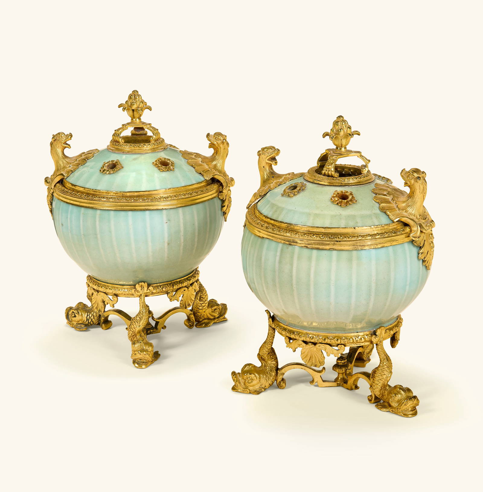 A PAIR OF LOUIS XIV ORMOLU-MOUNTED CHINESE CELADON PORCELAIN POTS-POURRIS THE ORMOLU CIRCA 1710, THE