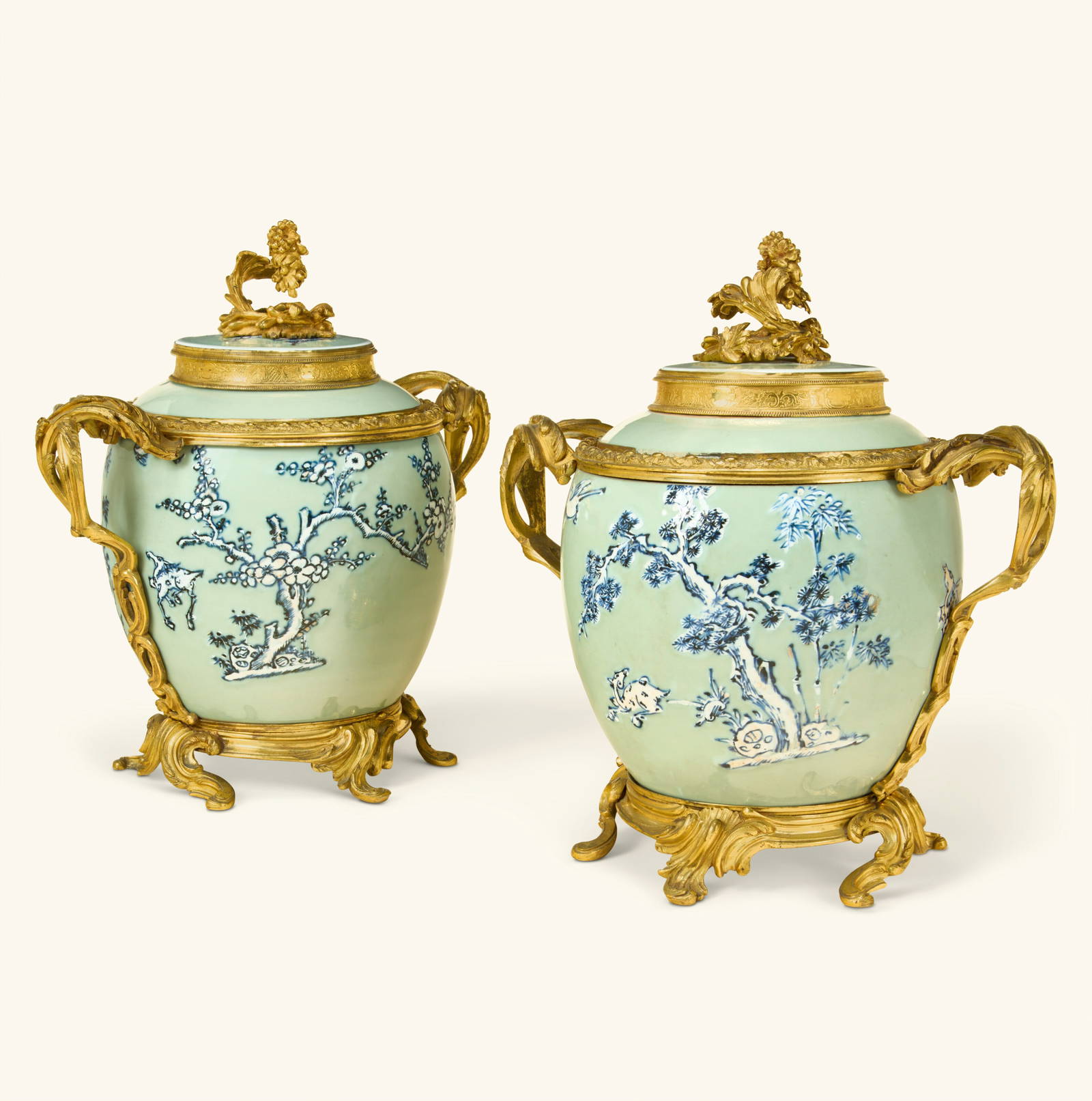 A PAIR OF LOUIS XV ORMOLU-MOUNTED CHINESE CELADON PORCELAIN VASES AND COVERS THE PORCELAIN EARLY