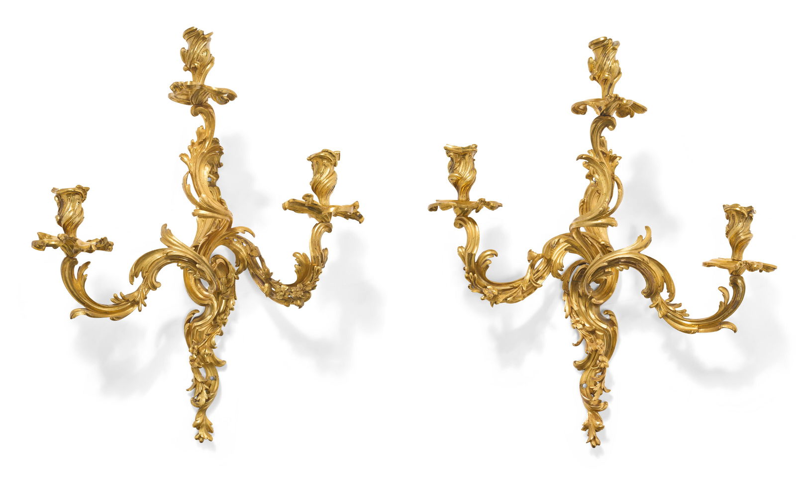 A PAIR OF LOUIS XV ORMOLU THREE-BRANCH WALL-LIGHTS IN THE MANNER OF JACQUES CAFFIERI, CIRCA (1 of 4)