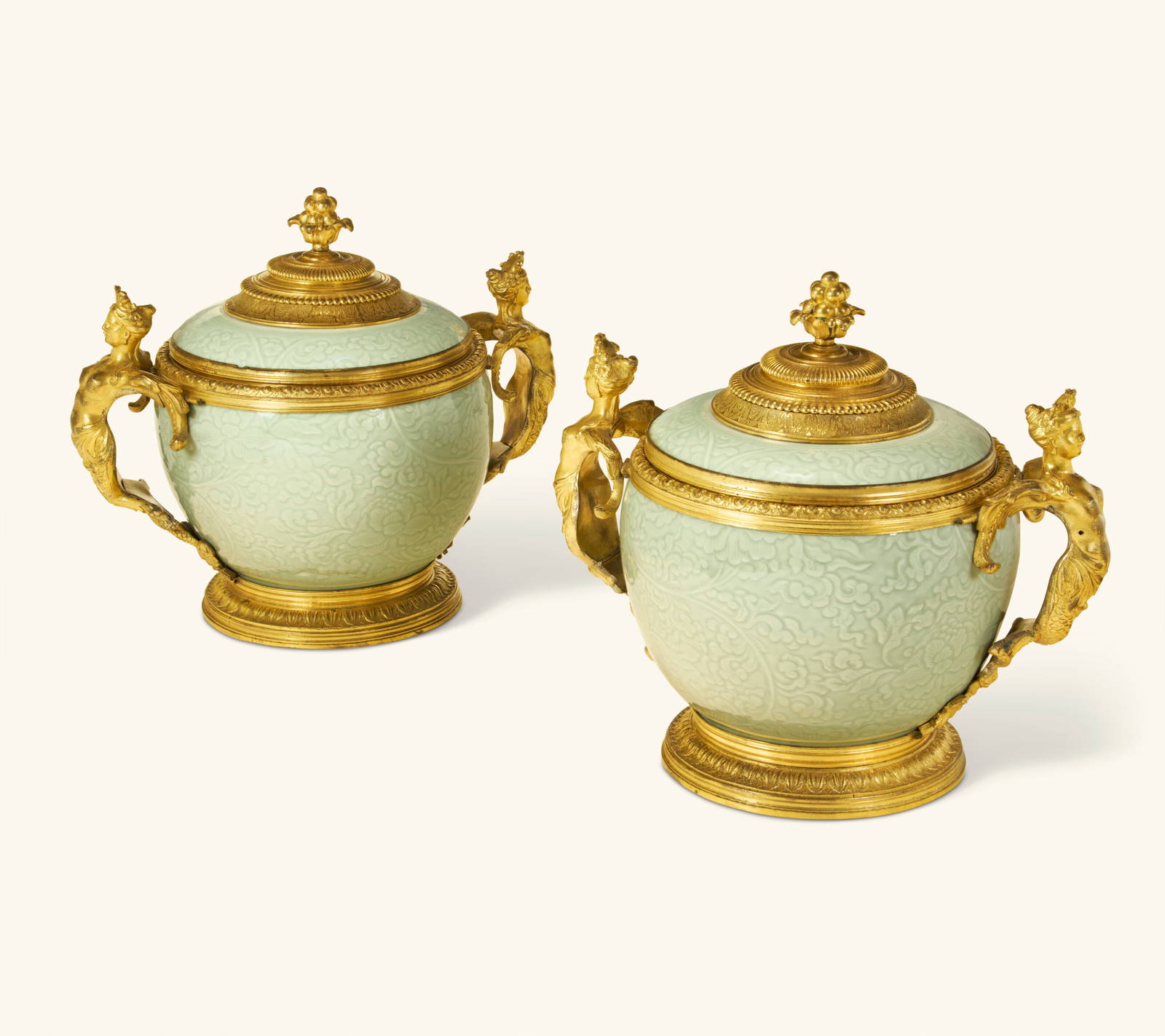 A PAIR OF REGENCE ORMOLU-MOUNTED CHINESE CELADON PORCELAIN VASES AND COVERS THE ORMOLU CIRCA 1720,