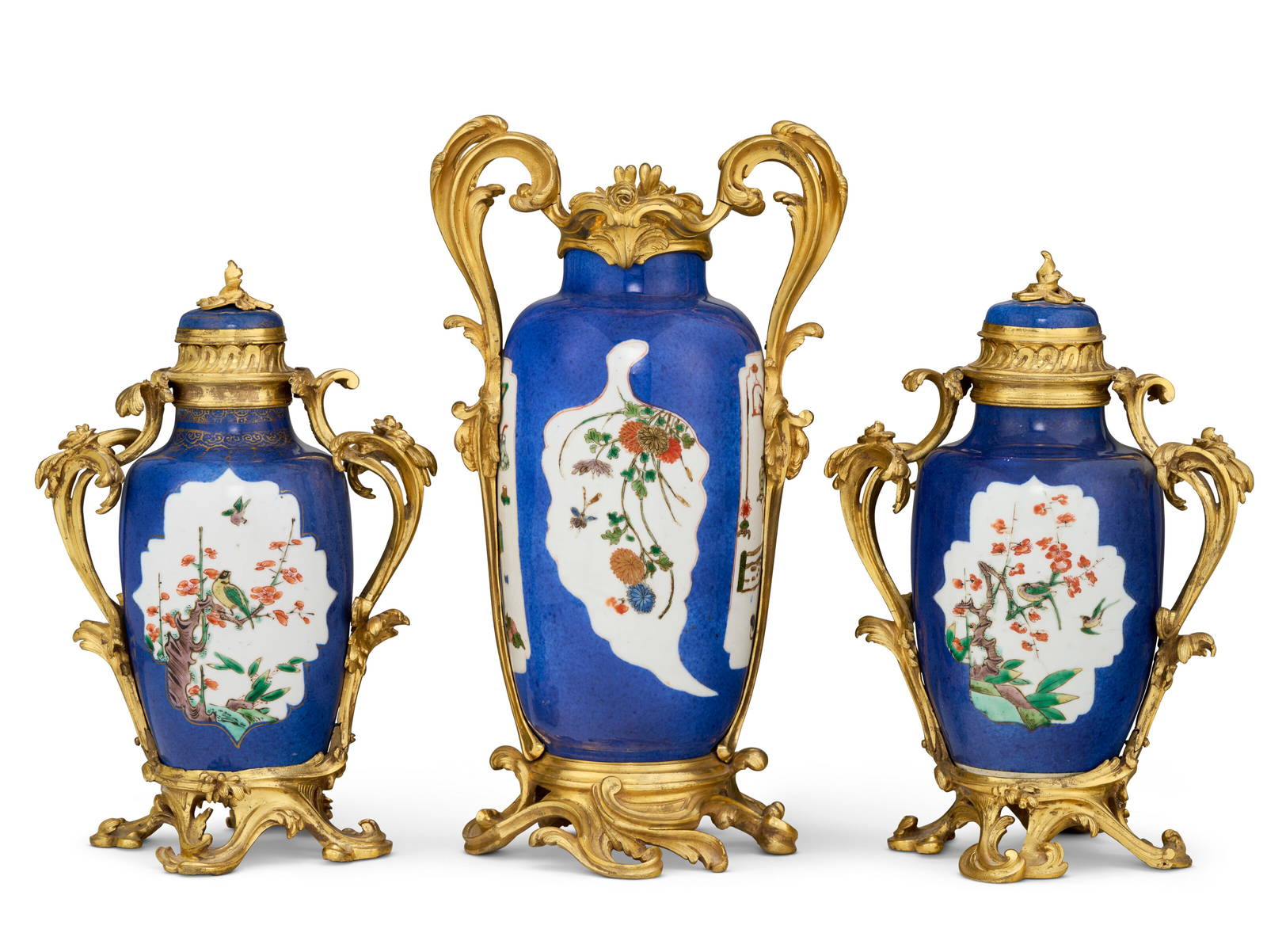 A THREE-PIECE LOUIS XV ORMOLU-MOUNTED POWDER-BLUE GROUND CHINESE PORCELAIN MATCHED GARNITURE THE