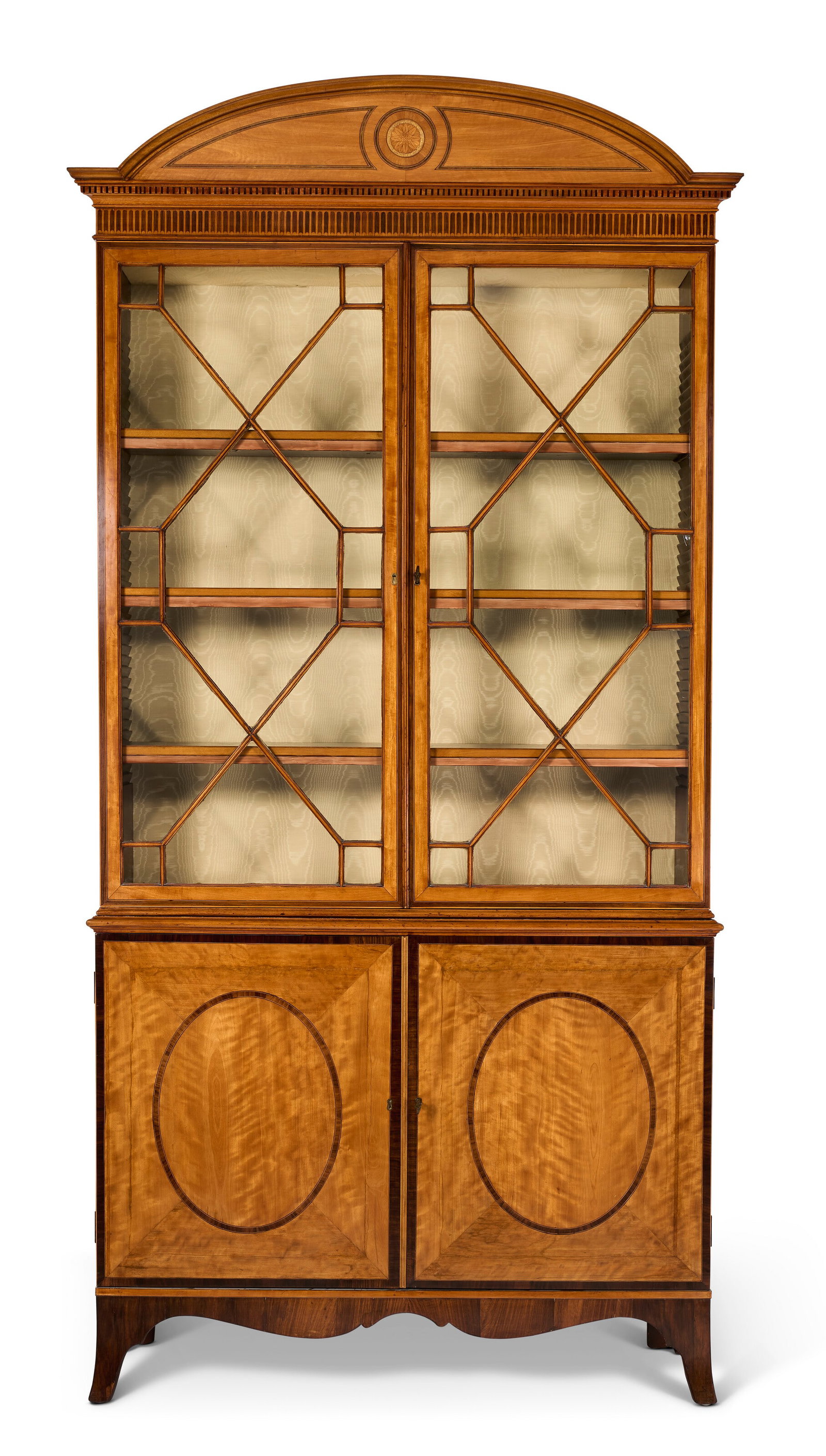 A GEORGE III SATINWOOD, TULIPWOOD AND INDIAN ROSEWOOD-BANDED BOOKCASE CIRCA 1790, THE CRESTING LATER (1 of 5)