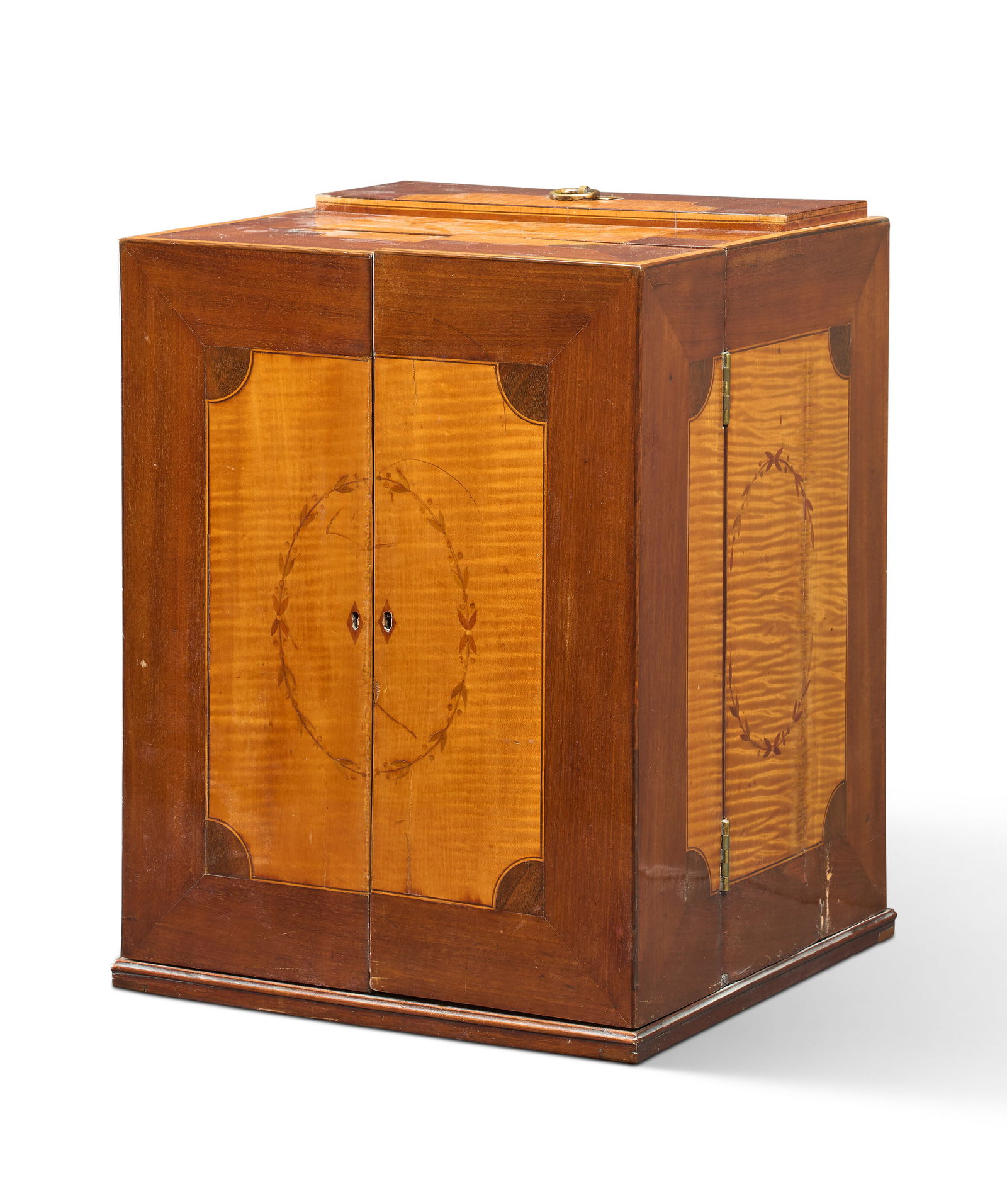 A GEORGE III SYCAMORE, MAHOGANY AND MARQUETRY TRAVELING CABINET BY WILLIAM ROBERTS, DATED 1798: A GEORGE III SYCAMORE, MAHOGANY AND MARQUETRY TRAVELING CABINET BY WILLIAM ROBERTS, DATED 1798 Details With lift-up glazed section, the base with a pair of doors enclosing shelves, the whole with cut-
