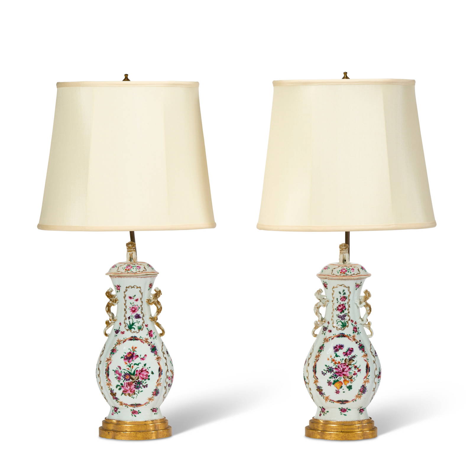 A PAIR OF CHINESE EXPORT PORCELAIN FAMILLE ROSE VASES AND COVERS, NOW MOUNTED AS LAMPS QIANLONG