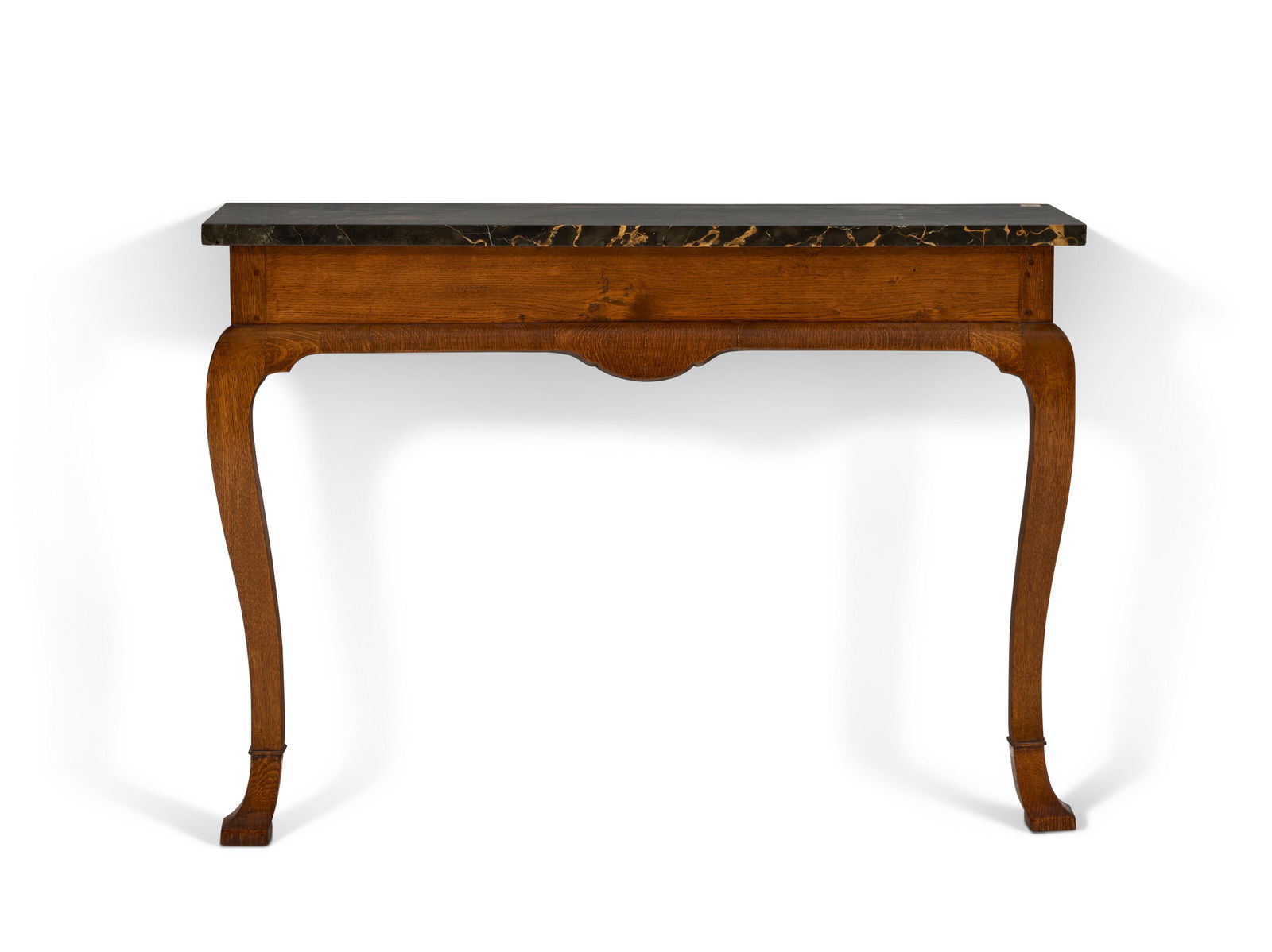 A GEORGE I OAK CONSOLE TABLE CIRCA 1715, POSSIBLY REDUCED IN DEPTH: A GEORGE I OAK CONSOLE TABLE CIRCA 1715, POSSIBLY REDUCED IN DEPTH Details With Portor marble top, the plain frieze with concave edge on squared cabriole legs and feet 293⁄4 in. (75.6 cm.) high,