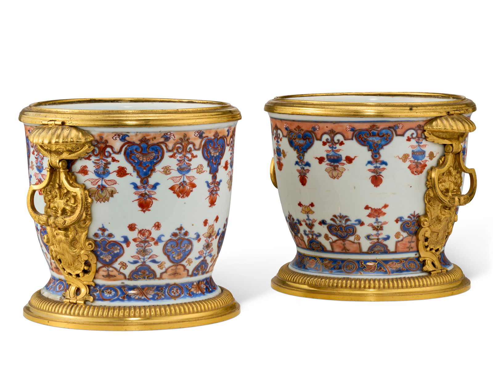 A PAIR OF ORMOLU-MOUNTED CHINESE IMARI EXPORT PORCELAIN CACHE-POTS THE PORCELAIN CIRCA 1720, THE (1 of 3)