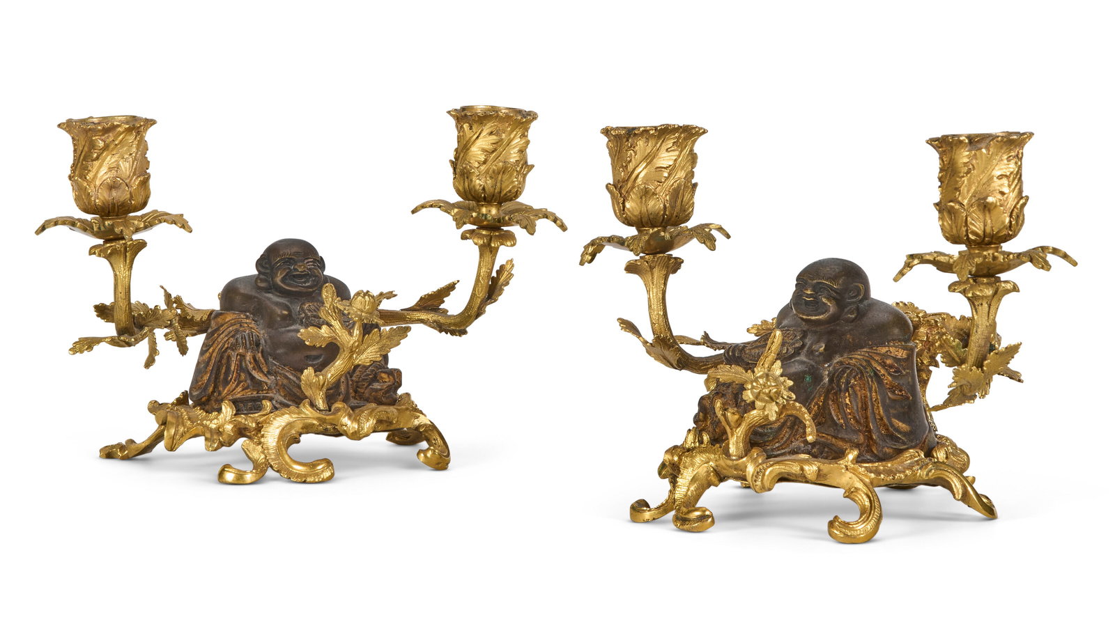 A PAIR OF LOUIS XV ORMOLU AND PATINATED BRASS TWO-BRANCH CANDELABRA THE ORMOLU CIRCA 1740, THE (1 of 4)