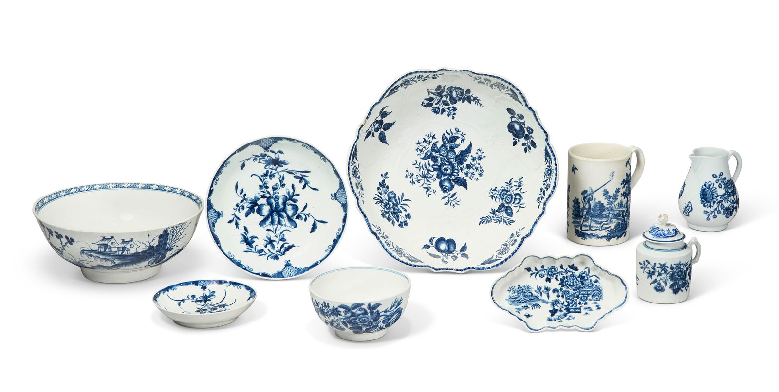 A GROUP OF WORCESTER PORCELAIN BLUE AND WHITE TABLE WARES CIRCA 1765-1780, MOST WITH CRESCENT MARKS (1 of 16)