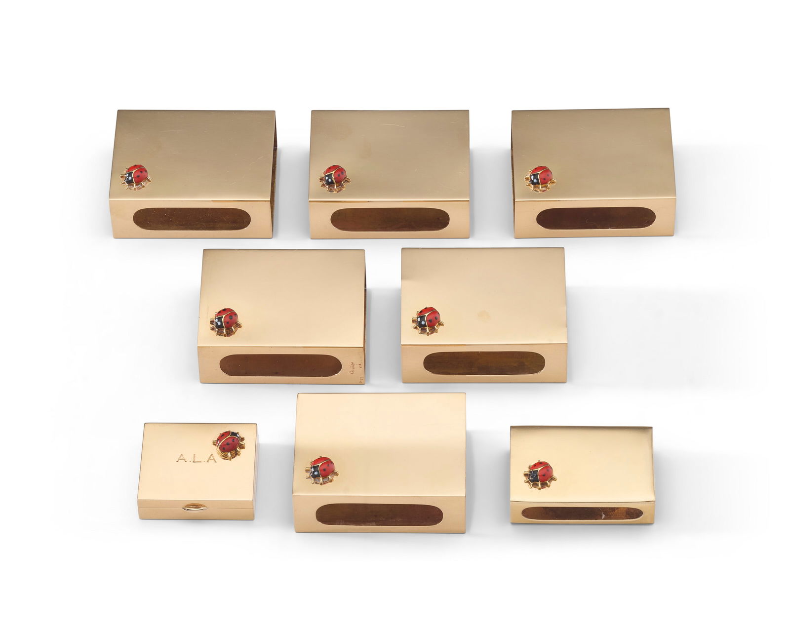 A SET OF SIX AMERICAN ENAMEL MOUNTED GOLD MATCHBOX HOLDERS MARK OF CARTIER, NEW YORK, CIRCA 1950, 14 (1 of 2)