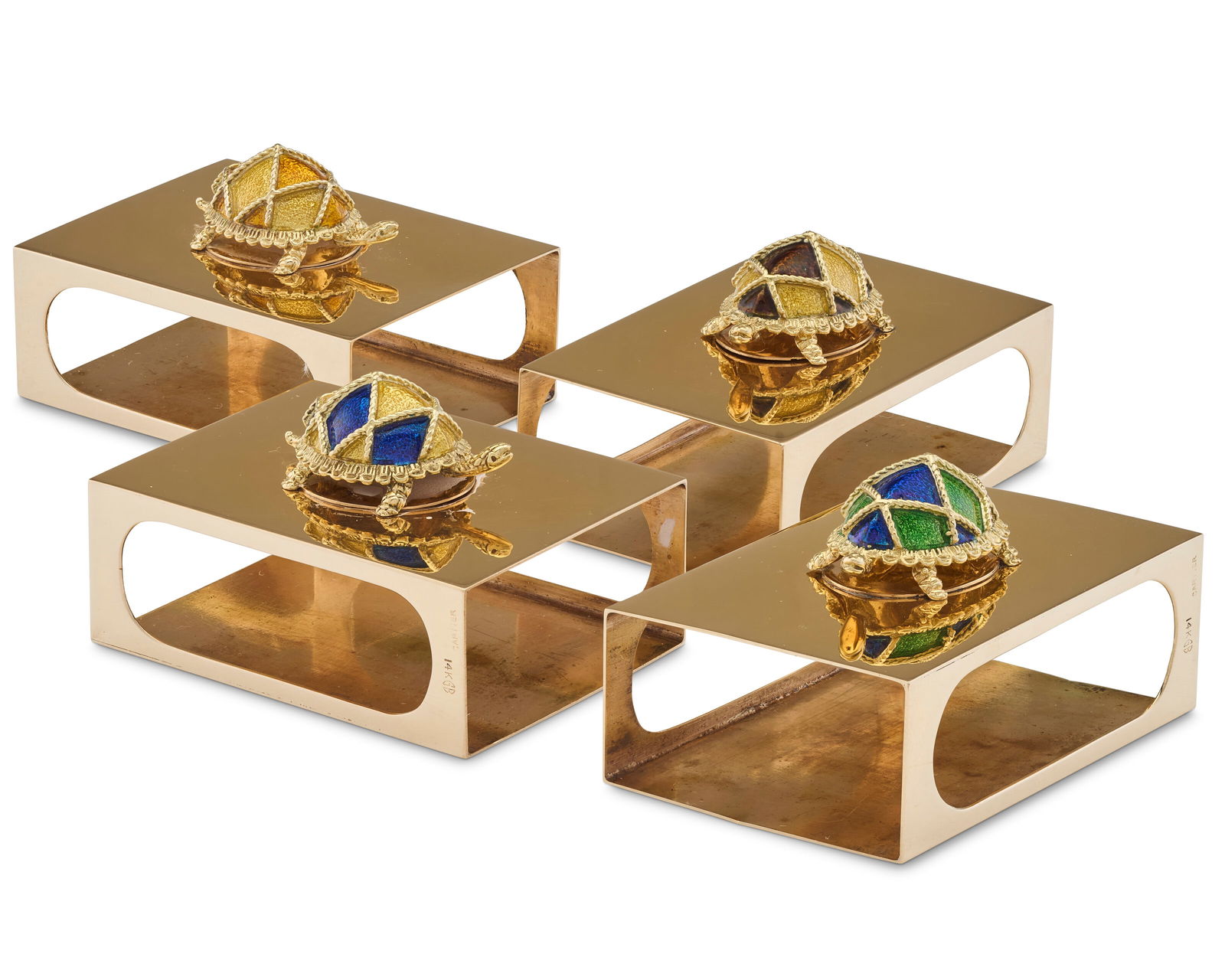 A SET OF FOUR AMERICAN GOLD MATCHBOX COVERS MAKER'S MARK GB, CIRCA 1967, RETAILED BY CARTIER, NEW: A SET OF FOUR AMERICAN GOLD MATCHBOX COVERS MAKER'S MARK GB, CIRCA 1967, RETAILED BY CARTIER, NEW YORK, 14 KARAT Details Rectangular mounted with turtles with vari-colored enamel backs in rope-twist l