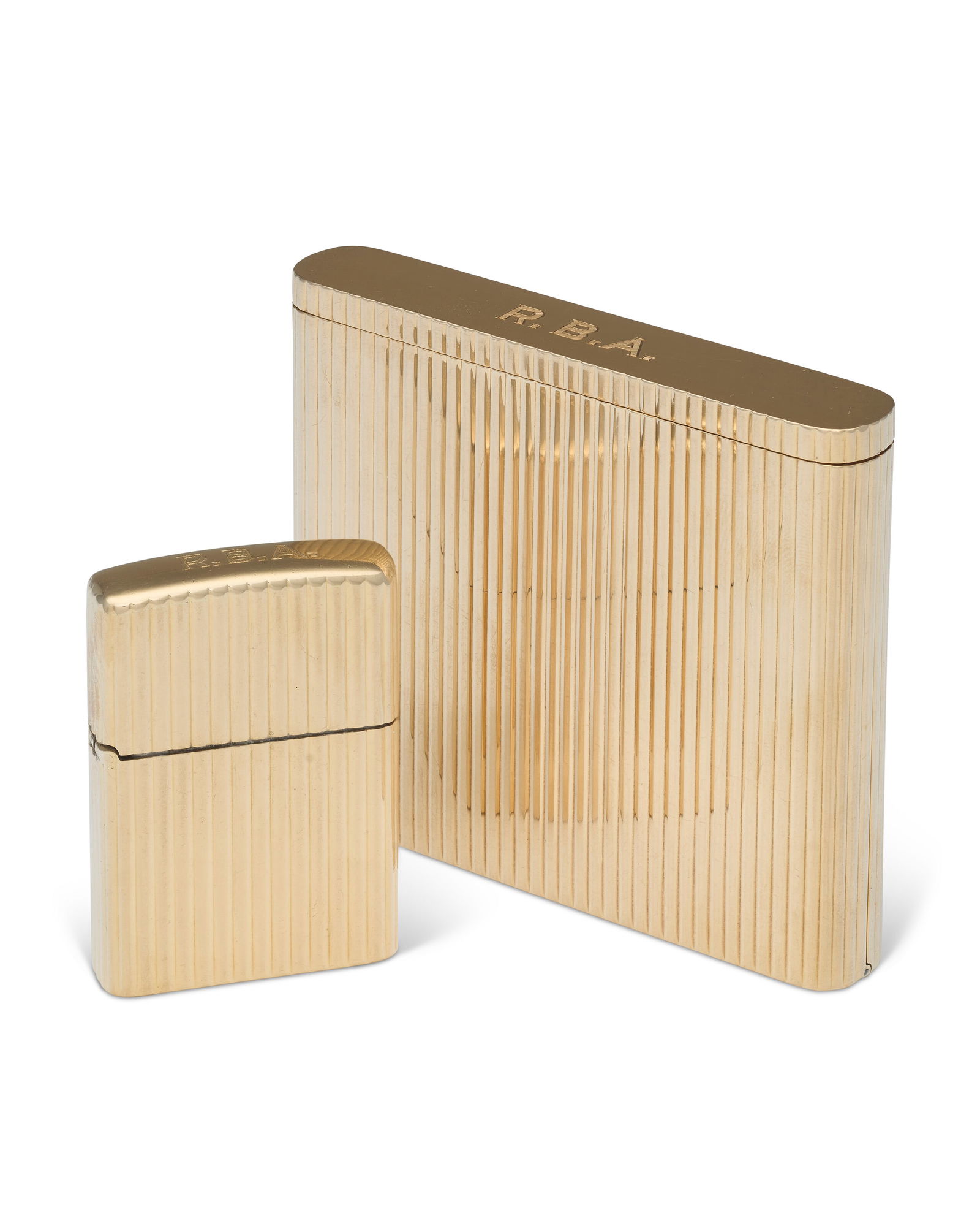 AN AMERICAN GOLD CIGARETTE CASE AND MATCHING LIGHTER MARK OF TIFFANY & CO., NEW YORK, FIRST HALF: AN AMERICAN GOLD CIGARETTE CASE AND MATCHING LIGHTER MARK OF TIFFANY & CO., NEW YORK, FIRST HALF 20TH CENTURY, 14 KARAT Details Both rounded rectangular with fluted bodies, engraved with monogram R.B.