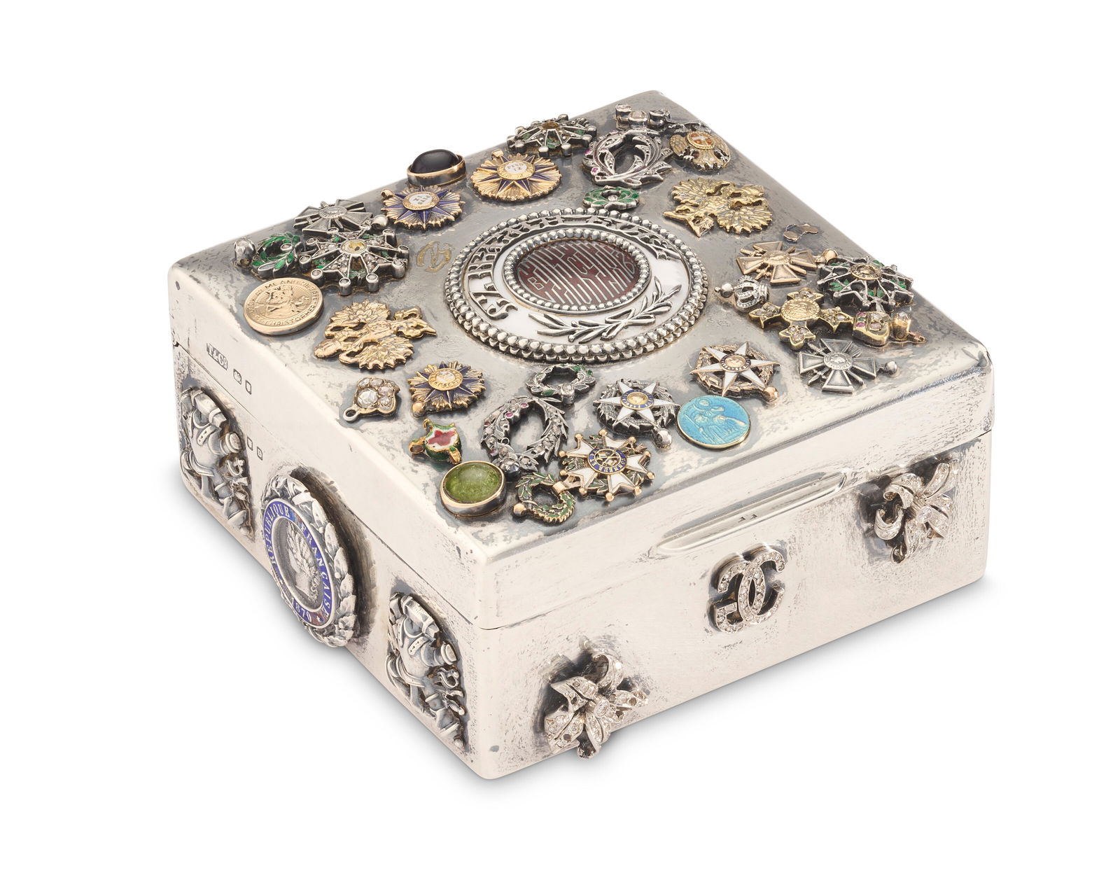 A GEORGE VI SILVER 'SCRAPBOOK' CIGARETTE BOX MARK OF TIFFANY & CO., LONDON, 1939 (1 of 5)