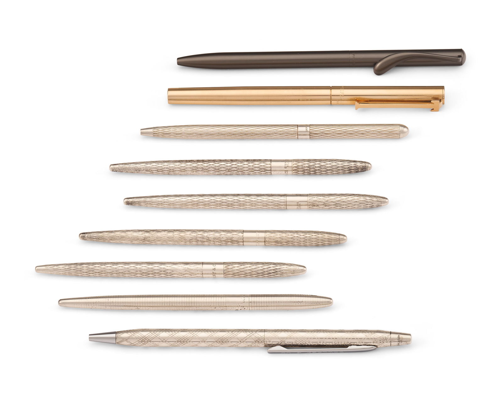 A GROUP OF NINE AMERICAN GOLD, SILVER, AND METAL PENS MARK OF TIFFANY & CO., NEW YORK, MID-20TH (1 of 2)