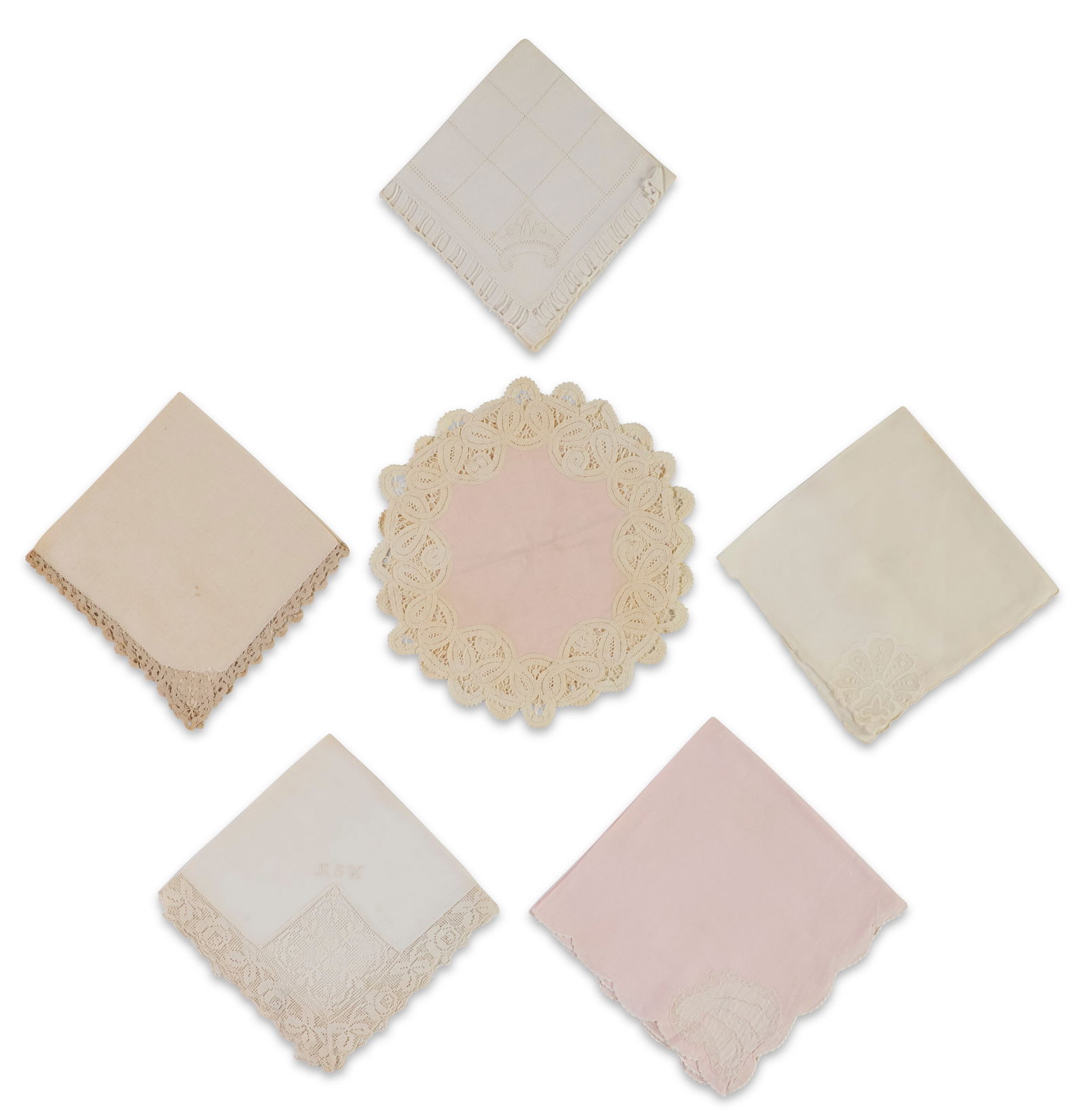GROUP OF PLACEMATS WITH ASSORTED NAPKINS 20TH CENTURY: GROUP OF PLACEMATS WITH ASSORTED NAPKINS 20TH CENTURY Details Eight shell form placemats, twelve shaped placemats with foliage elements, eight shaped placemats with pink trim and leaf detail, eight al