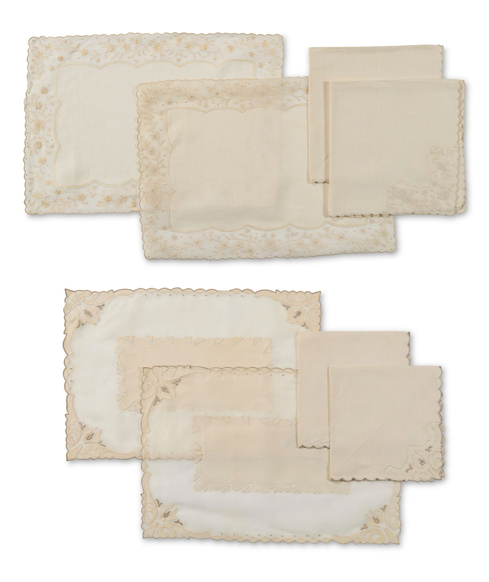 TWO SETS OF PLACEMATS AND NAPKINS 20TH CENTURY: TWO SETS OF PLACEMATS AND NAPKINS 20TH CENTURY Details Comprising one set of placemats with scalloped edges and floral applique detail and coordinating napkins and one set of placemats with foliate ap