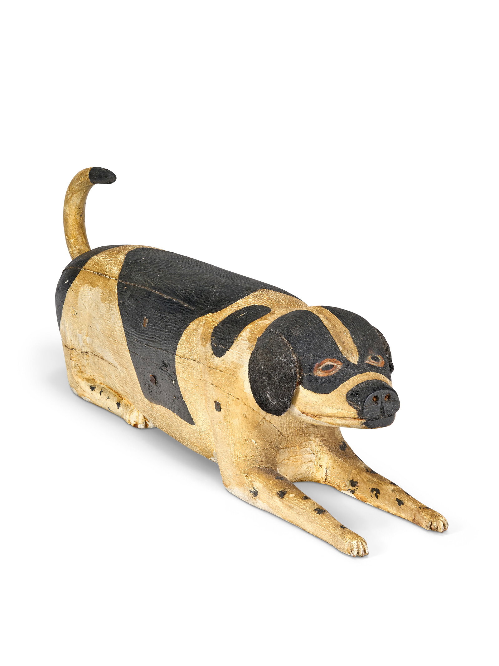 A CARVED AND PAINT-DECORATED WOOD RECLINING DOG AMERICAN, LATE 19TH CENTURY (1 of 6)