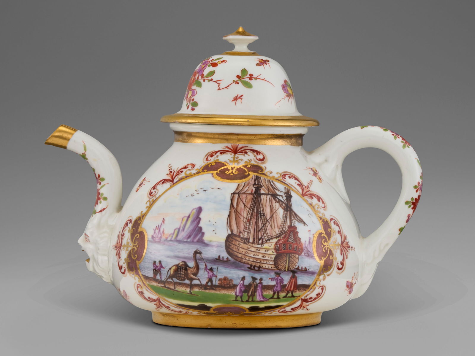 A MEISSEN PORCELAIN TEAPOT AND COVER CIRCA 1723-1724, BLUE K.P.M. AND CROSSED SWORDS MARK: A MEISSEN PORCELAIN TEAPOT AND COVER CIRCA 1723-1724, BLUE K.P.M. AND CROSSED SWORDS MARK Details With high domed cover, spired-button finial, loop handle and scroll spout above a molded lion mask, bo
