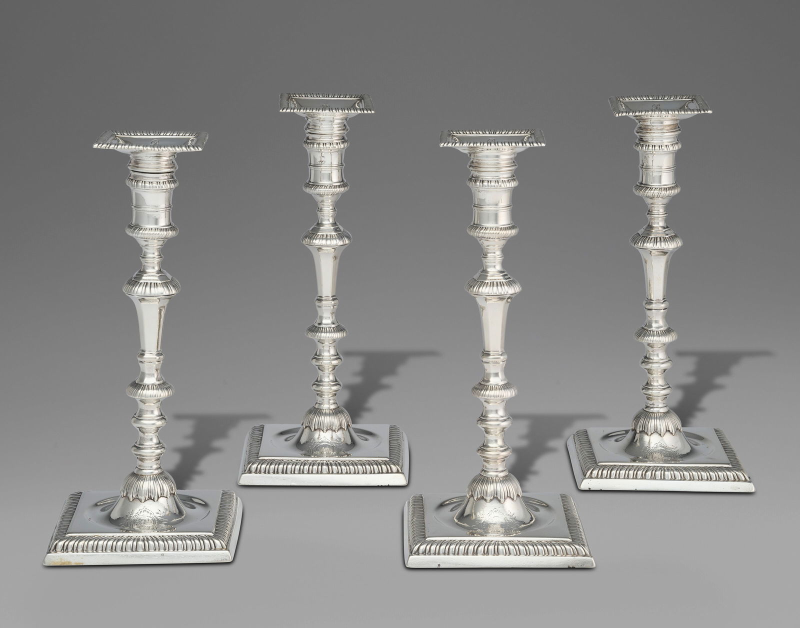 A SET OF FOUR GEORGE II SILVER CANDLESTICKS MARK OF JOHN CAFÉ, LONDON, 1756 (1 of 5)