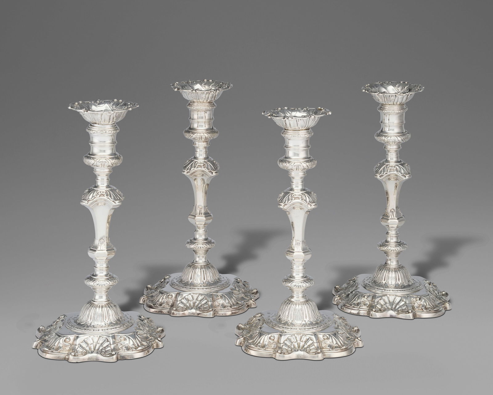 A SET OF FOUR GEORGE II SILVER CANDLESTICKS MARK OF CHARLES FREDERICK KANDLER, LONDON, 1746 (1 of 1)