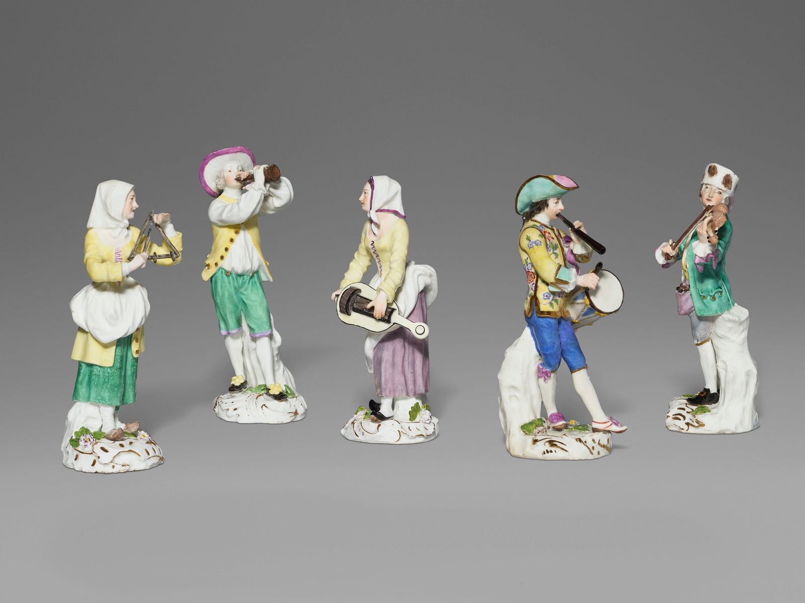 FIVE MEISSEN PORCELAIN 'CRIS DE PARIS' FIGURES OF MUSICIANS FOUR CIRCA 1755, THE DRUMMER'S PORCELAIN (1 of 5)