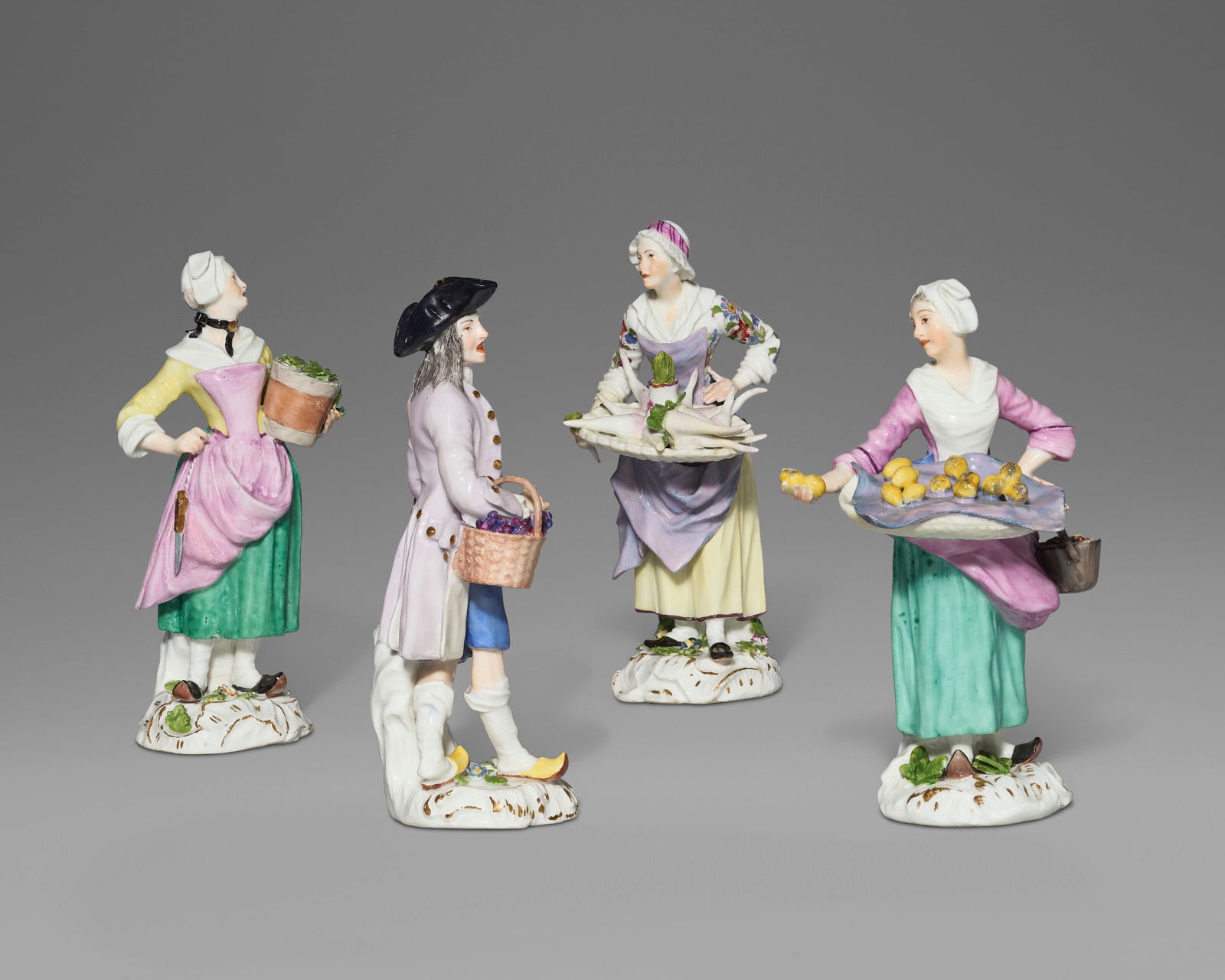 FOUR MEISSEN PORCELAIN 'CRIS DE PARIS' FIGURES OF FRUIT OR VEGETABLE SELLERS CIRCA 1755, SMALL BLUE (1 of 5)