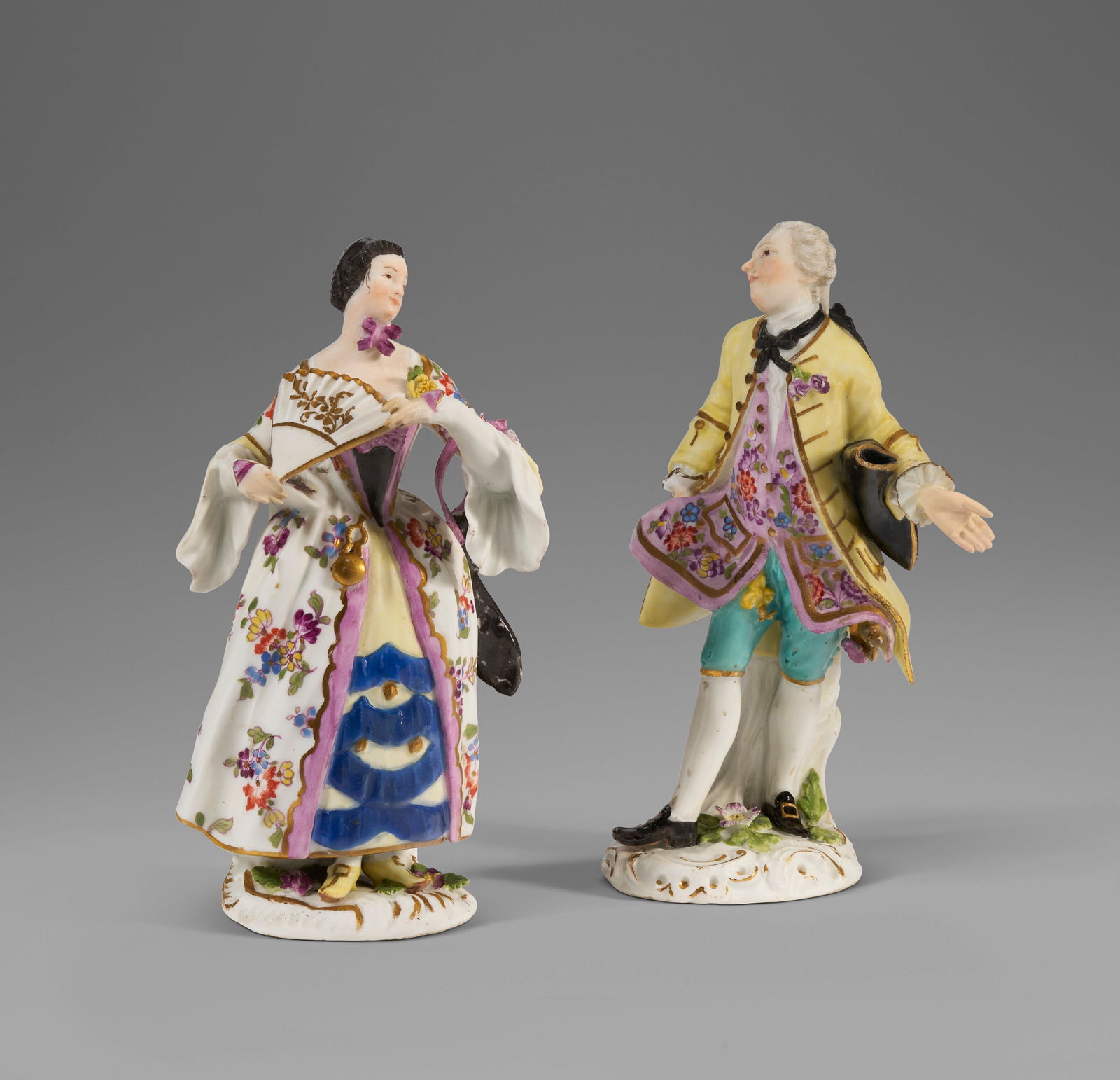 A PAIR OF MEISSEN FIGURES OF A COURTESAN AND A DANDY FROM THE ‘CRIS DE PARIS’ SERIES (1 of 5)