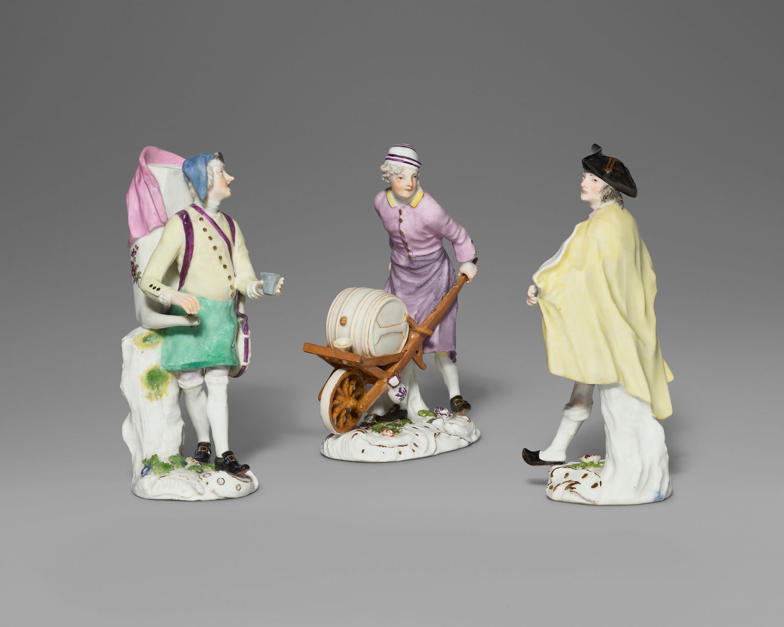 THREE MEISSEN PORCELAIN MALE 'CRIS DE PARIS' FIGURES CIRCA 1755, SMALL BLUE CROSSED SWORDS TO THE (1 of 5)