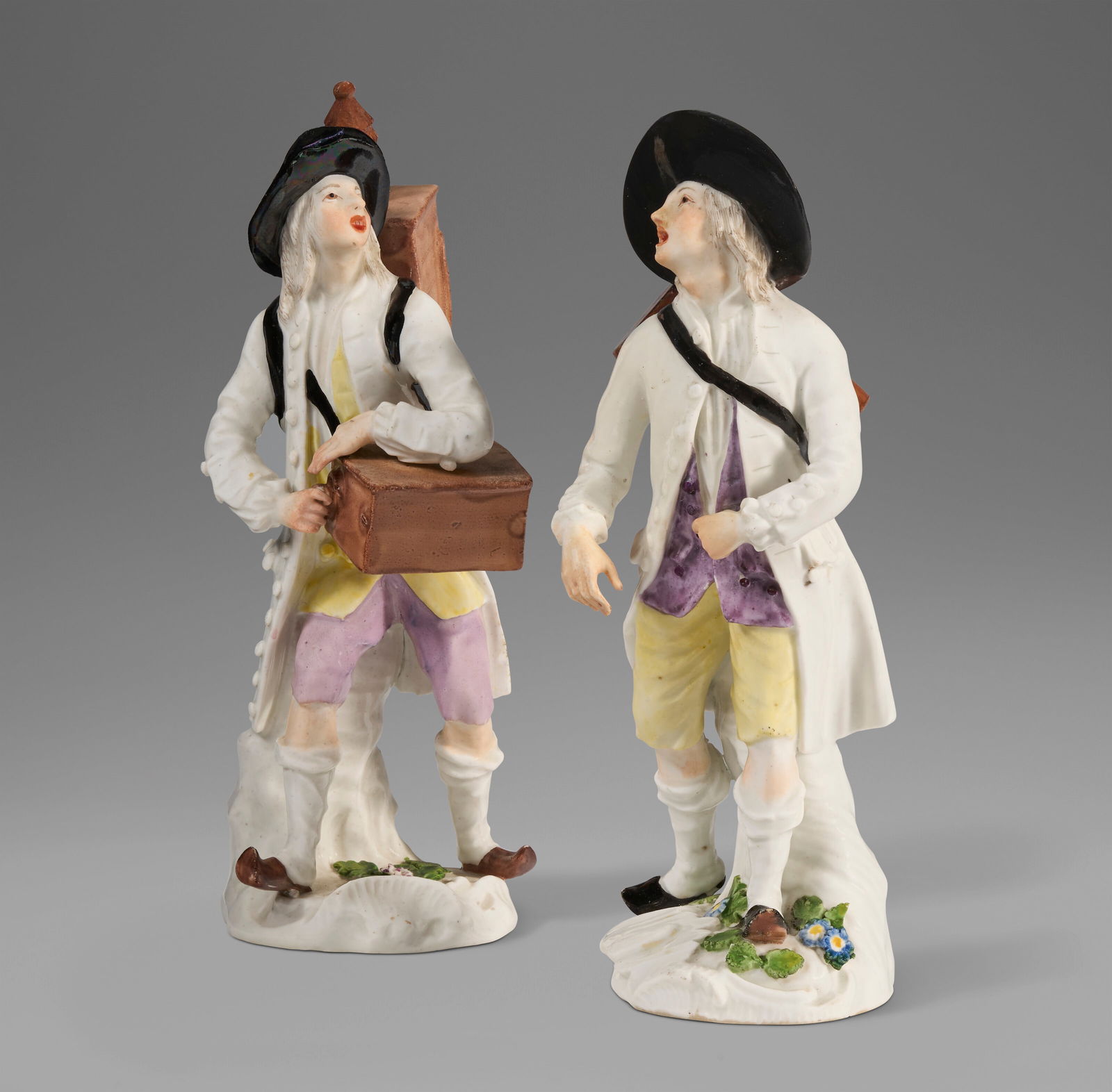 TWO MEISSEN PORCELAIN MALE 'CRIS DE PARIS' FIGURES OF ENTERTAINERS CIRCA 1755, SMALL BLUE CROSSED (1 of 5)